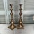 Tall bulb shape brass candleholders on footed square plinth. Great size for tables, buffets, etc. Measures 6.5” square x...