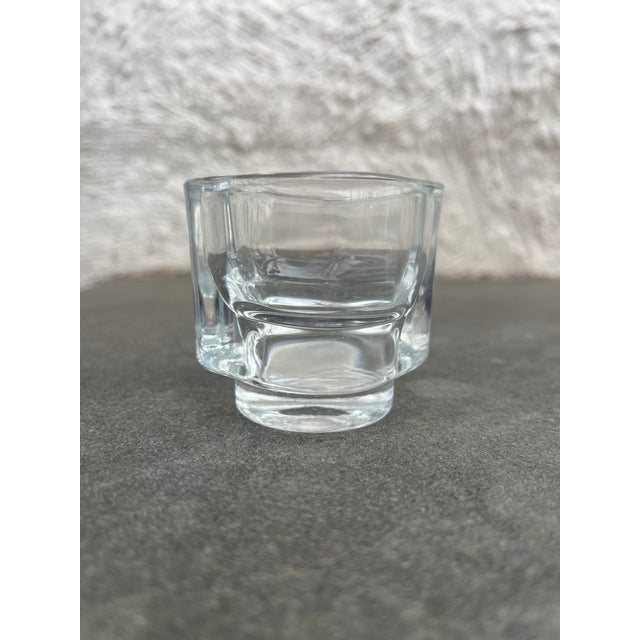 Four square glass egg cup / candle holder with rounded edges on a pedestal base. Designed by Joe Colombo for Fidenza,...