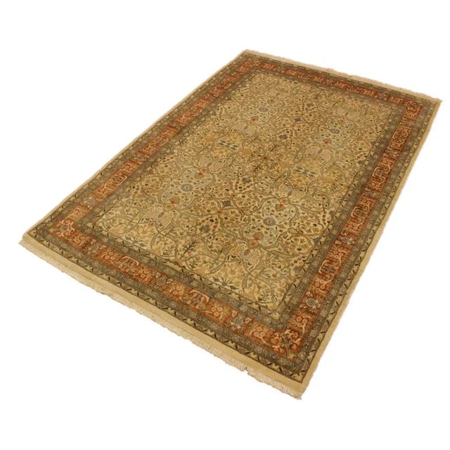 Designed with mesmerizing intricacy and gorgeous color palette, this hand-knotted masterpiece demonstrates the beauty and...