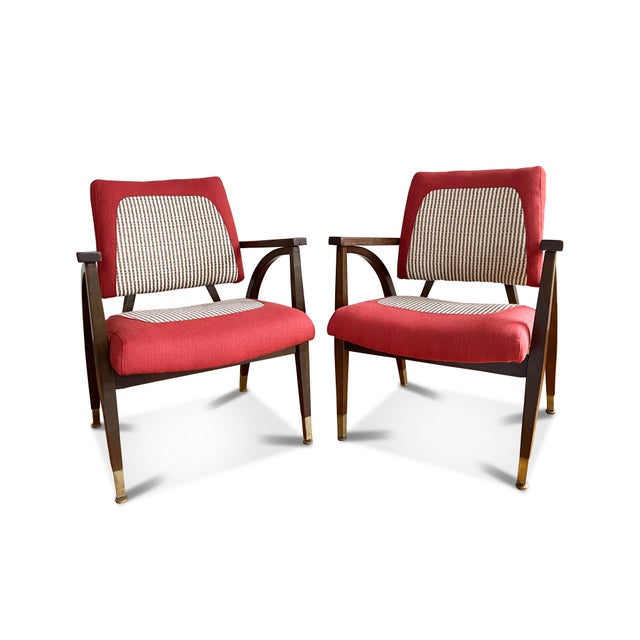A pair of sculptural side chairs from the Boling Chair Company. The accent chairs feature curved walnut frames and newly...