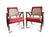 A pair of sculptural side chairs from the Boling Chair Company. The accent chairs feature curved walnut frames and newly...
