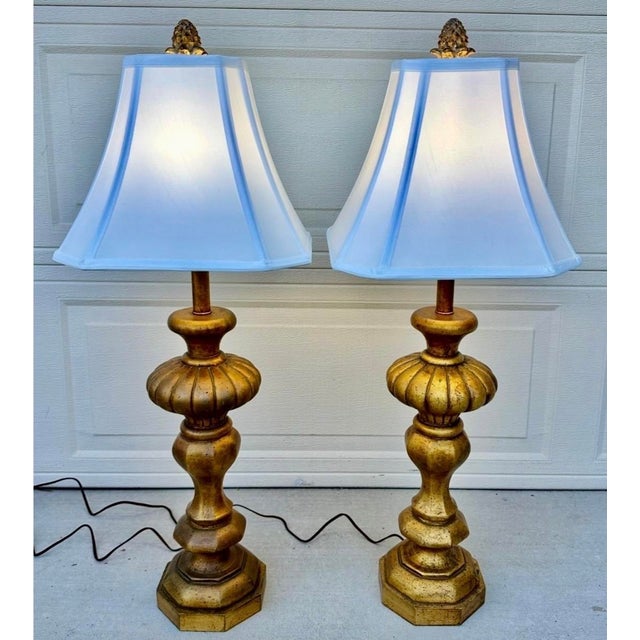 Pair of Monumental 1920s Italian Carved Giltwood Pineapple Table Lamps - 36" Tall Hollywood Regency A spectacular pair of...