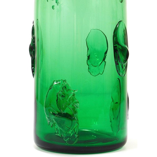 A beautiful and large Italian Vetrerie di Empoli vase from the 1960s, hand-blown from thick vibrant emerald green glass....