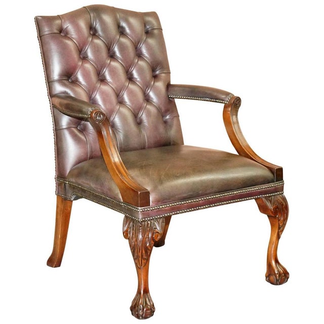 We are delighted to offer for sale this stunning hand carved mahogany framed George II style Gainsborough armchair with...