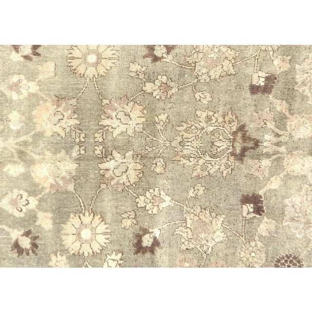 1950s Turkish Oushak Rug. Handwoven with wool on wool foundation in the Oushak region of Western Turkey. The Anatolian...