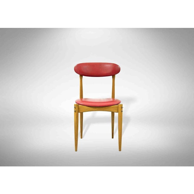 Set of 6 Vintage chairs is an original design furniture realized in the half of 20th century. Wood and Skai chairs red...