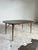 Mid Century Modern Oval Walnut Dining Table For Sale - Image 4 of 7