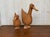 Wicker duck from with an intricate woven wicker structure and highlighted with wood wings and a sculpted bill and feet.