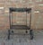 Circa 1980s wrought iron bar cart by Russell Woodard. The "Arnold Palmer" collection, created in 1978. Woven surfaces,...