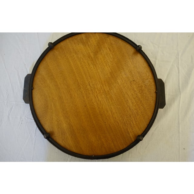 solid construction tray in art deco hammered iron, painted glass on the reverse signed Datty, beautiful orange-red flower...