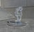 A striking Ring Tray from Lalique France, this exemplar features a prideful and elegant frosted ram at center of a...