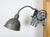 This vintage industrial adjustable gooseneck grey scissor wall light was produced by Elektroinstala Dečín in former...
