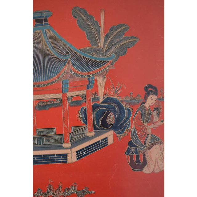 An exceptional vintage Chinese red-lacquer low table by Far Eastern Furnishings Co., distinguished by an extensively hand-...