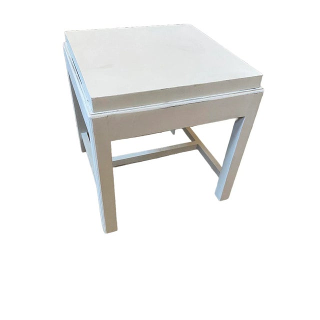 Nice white square shaped side/end table. Has been repainted white and distressed.