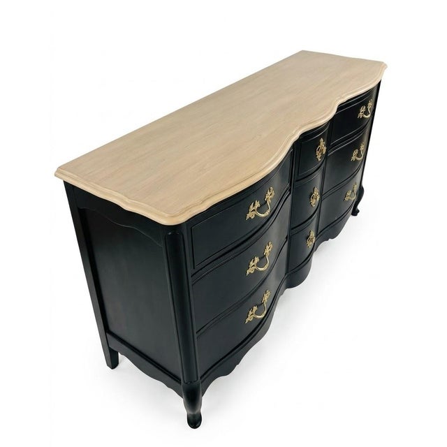 Vintage French Provincial Nine-Drawer Sideboard/Dresser by Bassett Furniture Company Graceful movement and modern drama...