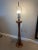 Monumental solid wood turned hourglass lamp in the style of Modeline and Phillip Lloyd Powell. Unsigned. Narrow center...