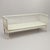 An early 20th Century, antique Swedish Gustavian daybed made of hand crafted painted Pinewood, in good condition. The tall...