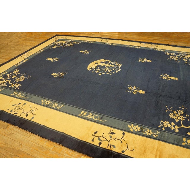 Special Aysimmetric Detail in a Chinoiserie Pattern a Navy Open Field Chinese Peking Rug For Sale - Image 10 of 11