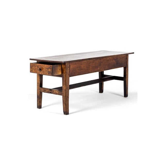 An exceptional 18th century provincial farmhouse dining table made of mixed woods of excellent and honest workmanship. The...