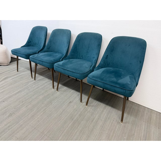 Design Plus Gallery presents a Set oF Four Mid-Century Dining Chairs from West Elm. The chairs have been inspired by mid-...