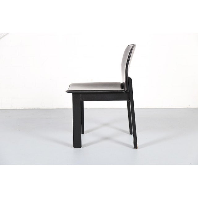 A set of six rare chairs that are reminiscent of designs by the designers Afra & Tobia Scarpa (model 121) and are often...