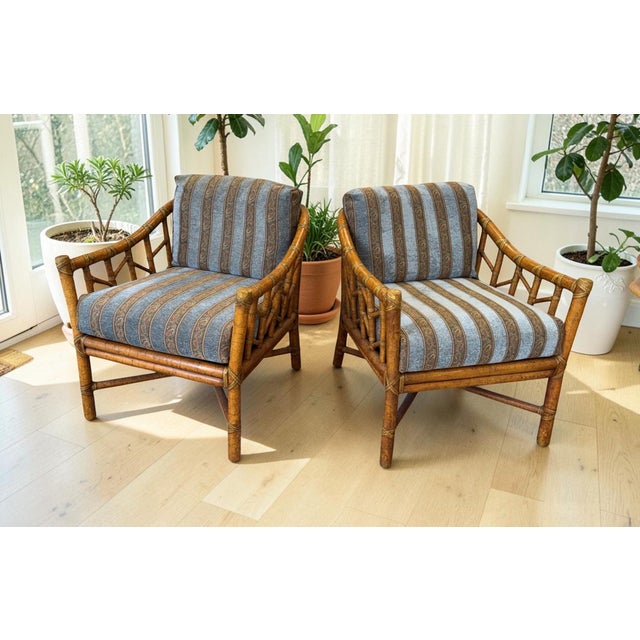 A pair of vintage McGuire organic modern lounge chairs. Designed by Elinor McGuire in the 1950s, these classic handcrafted...