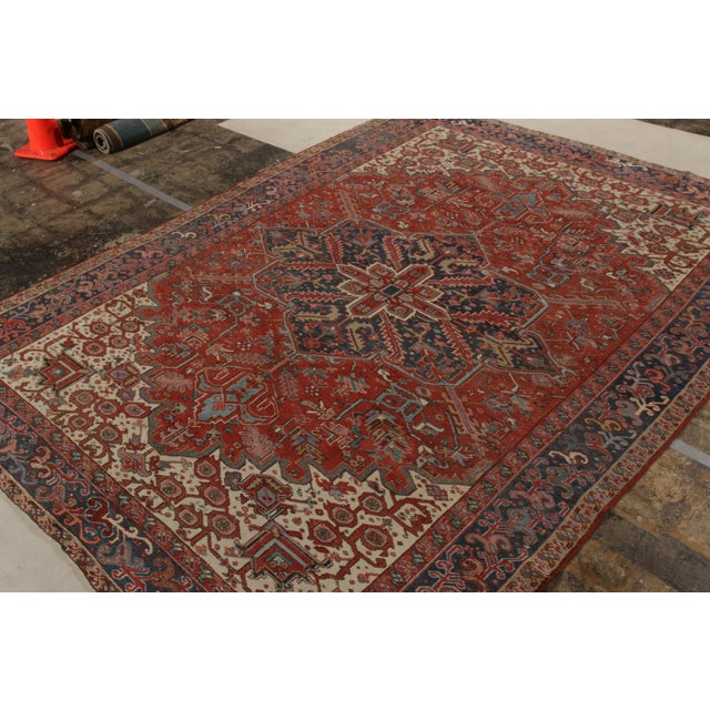 Hand-knotted in wool, an antique Heriz rug originating from Persia circa 1920-1930. Joining Rug & Kilim’s Antique &...