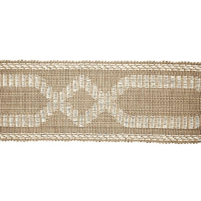 A simple tone-on-tone geometric accessory packs another layer of interest thanks to a rich, raffia-like texture. Sold as a...
