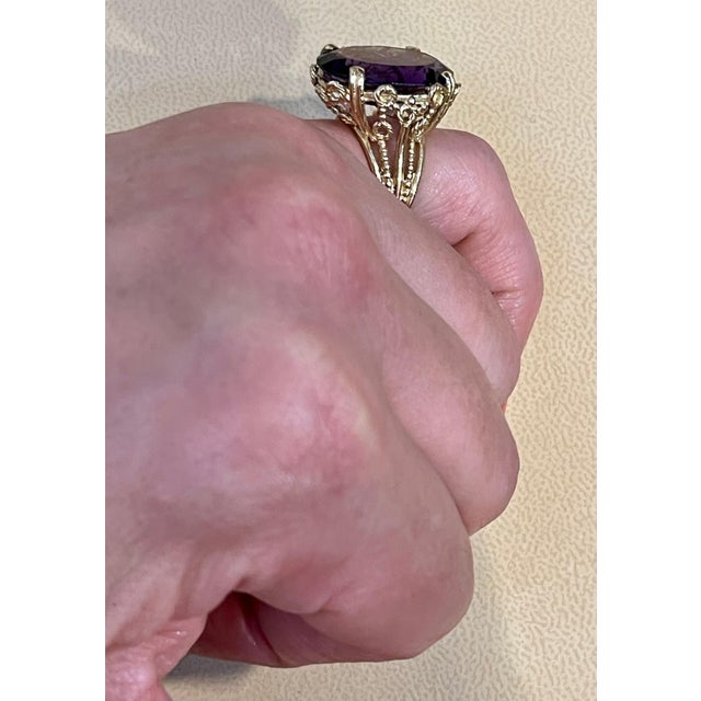 Approximately 13 Carat Beautiful Amethyst Cocktail Ring in 14 Karat Yellow Gold Size 5.5 This is a Beautiful Cocktail ring...