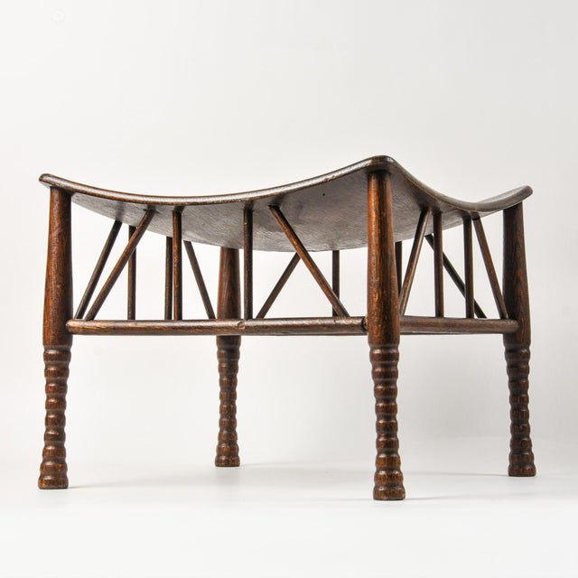 Incredible early 20th century small furniture piece in the style of Liberty of London. This elegant Egyptian Revival...