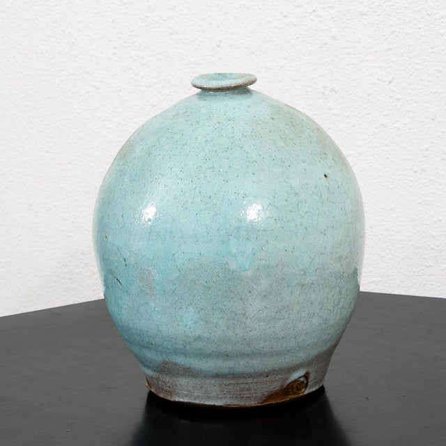 Vintage Teal blue ceramic vase. Great in nearly any setting.