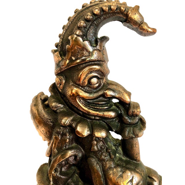 This iconic item is a Victorian-era antique cast iron "Mr. Punch and Toby" doorstop. It depicts the famous character Mr....