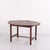 Butler coffee table crafted in polished mahogany with brass fittings. Dating from around the 1940s, the table has a...