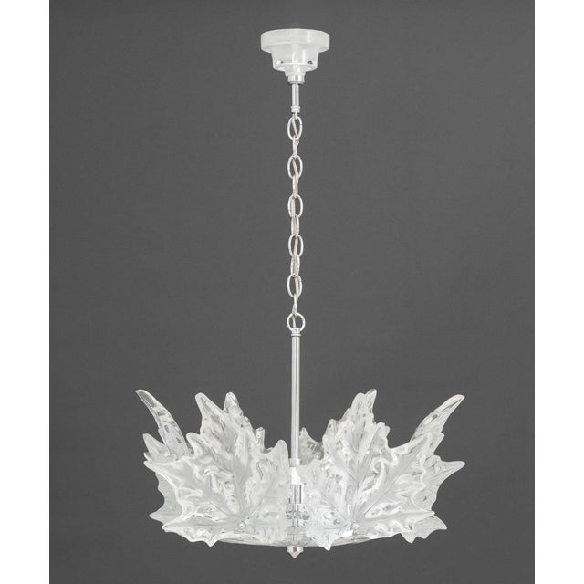 Lalique Champs-Elysees Chandelier, six-lights with molded clear and frosted leaf motif on chrome-plated hexagonal frame,...