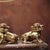 This charming pair of gilt bronze guardian lions adds a touch of traditional elegance to any space. Each lion is finely...