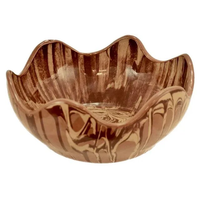 Large nine inch deep wave rim studio art clay bowl in a three tone swirled clay in tan and chocolate on cocoa brown with...