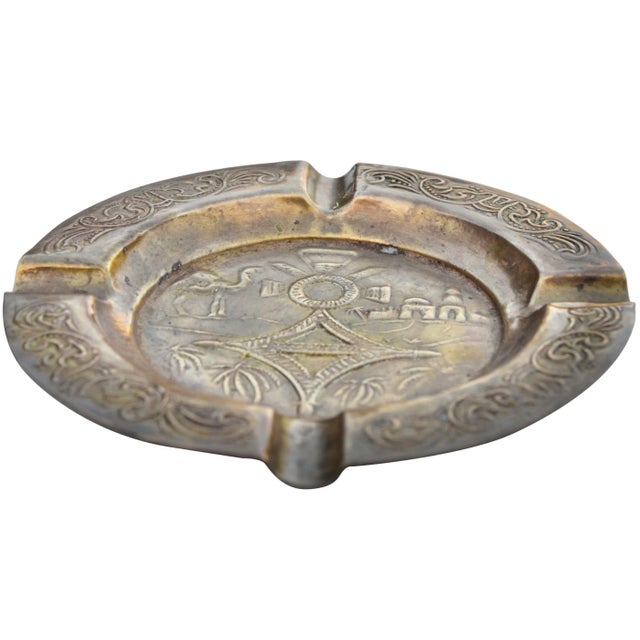 One-of-a-kind antique highly crafted, engraved and detailed Moroccan solid brass ashtray. Featuring an elaborate hand-...