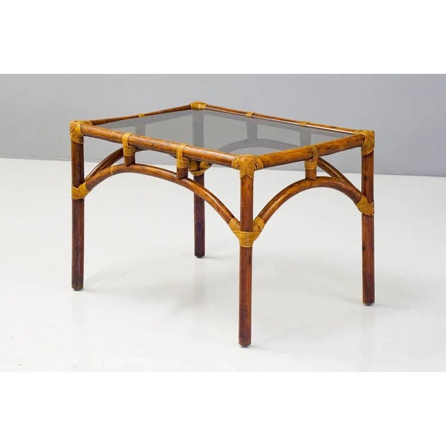 Bamboo framed side table with new toughened smoked glass top. Nice colour and patina.