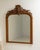 This piece presents as a cabinet, distinguished by medium honey oak, carved scroll. Originating in France during 19th...