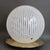 A large 1970s italian murano glass globe table lamp . Modernist and elegant, this blown murano table lamp provides a...