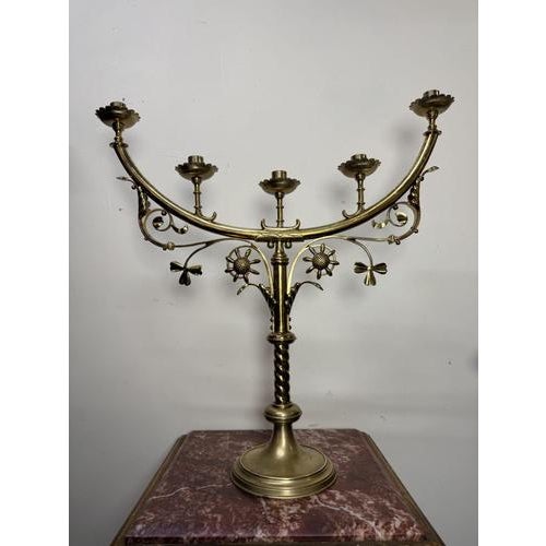 Early 20th century large brass candelabra with five arms, beautifully decorated with foliage and ornamental details. The...