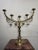 Early 20th century large brass candelabra with five arms, beautifully decorated with foliage and ornamental details. The...