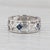 Gemstone Information: - Natural Sapphires - Total Carats - 0.60ctw Cut - Square Color - Dark Blue Treatment - Heated -...