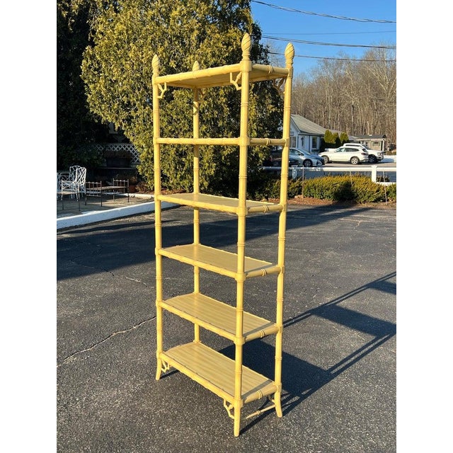 Palm Beach Regency Yellow Faux Bamboo Etagere Bookcase. Perfect bookcase for displaying books and decorative items with 6...