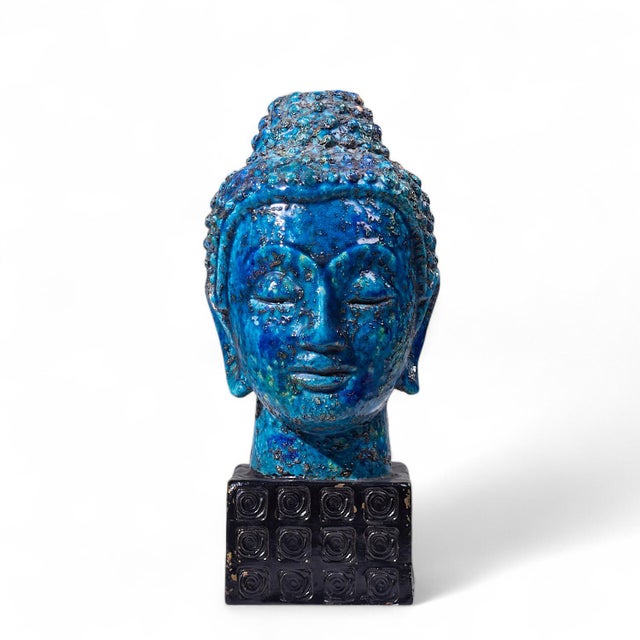 Aldo Londi for Bitossi Mid Century Blue Buddha Bust This bust measures: 5.5 wide x 6.75 deep x 11.25 inches high ABOUT...