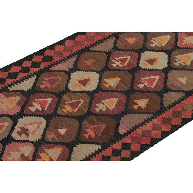 This vintage 5x12 Persian Kilim is a tribal rug from Meshkin—a small northwest village known for its fabulous works....