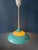Rare blue UFO-shaped pendant lamp designed by Knud Christensen, showcasing the sleek, futuristic aesthetics of...