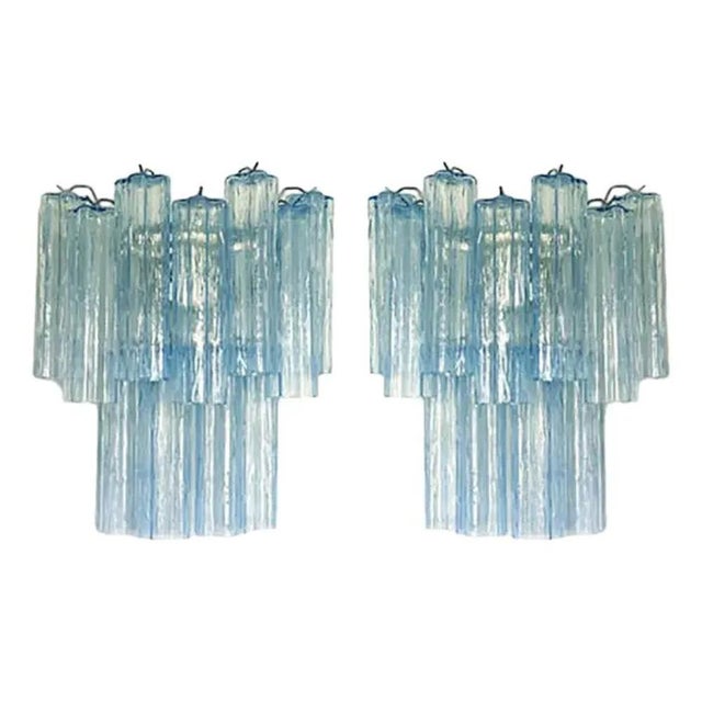 Contemporary light-blue “tronchi” wall sconce in venini style - a pair a pair of contemporary“tronchi” wall sconce. two...