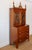 This elegant Federal-period secretary bookcase exemplifies the refined proportions and craftsmanship that defined early...
