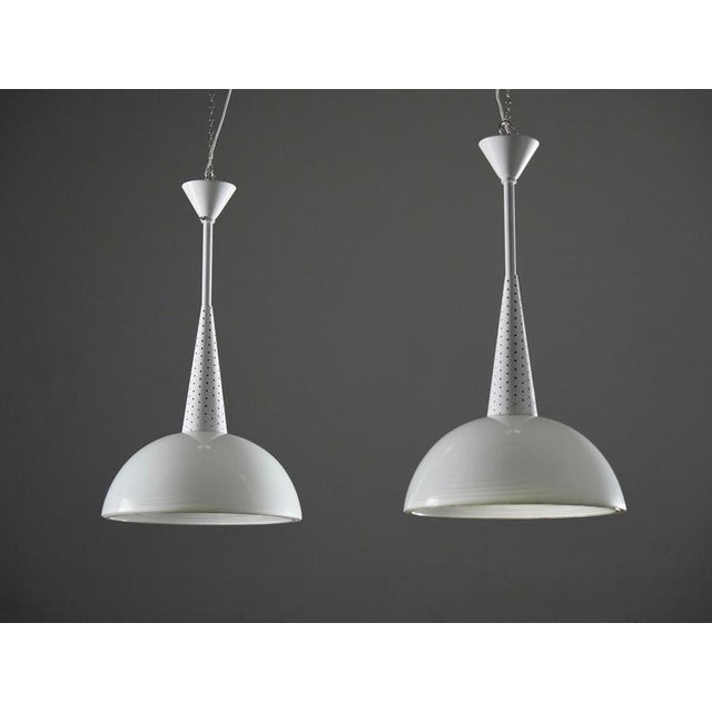 Set of 2 Mathieu Matégot for Holophane Ceiling Lamps in Metal and Glass, 1960's Unique set of two pendants designed by...